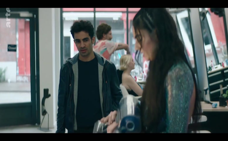 Bayan Layla Breasts Scene in Informant