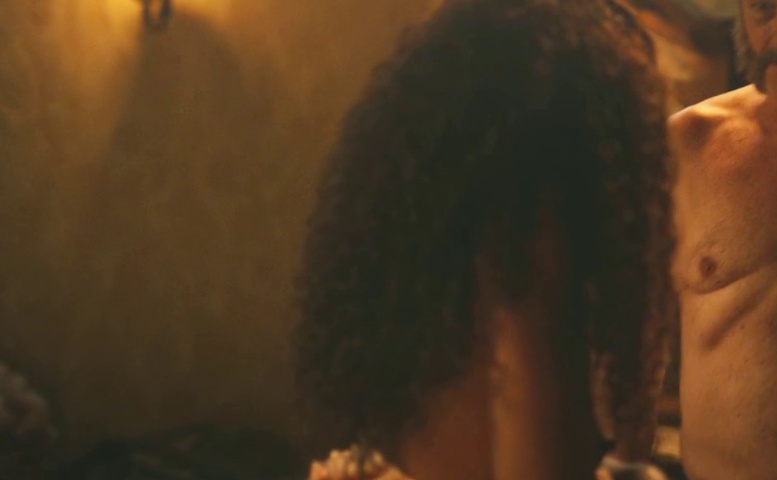 Erika Januza Breasts Scene in Madam Beja